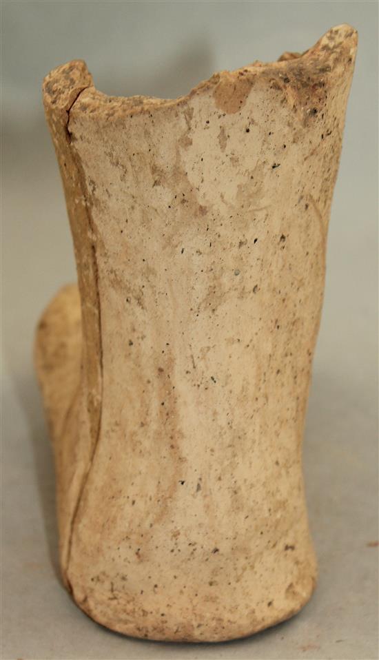 An Etruscan terracotta votive left foot, c.3rd century BC, 21cm, repaired